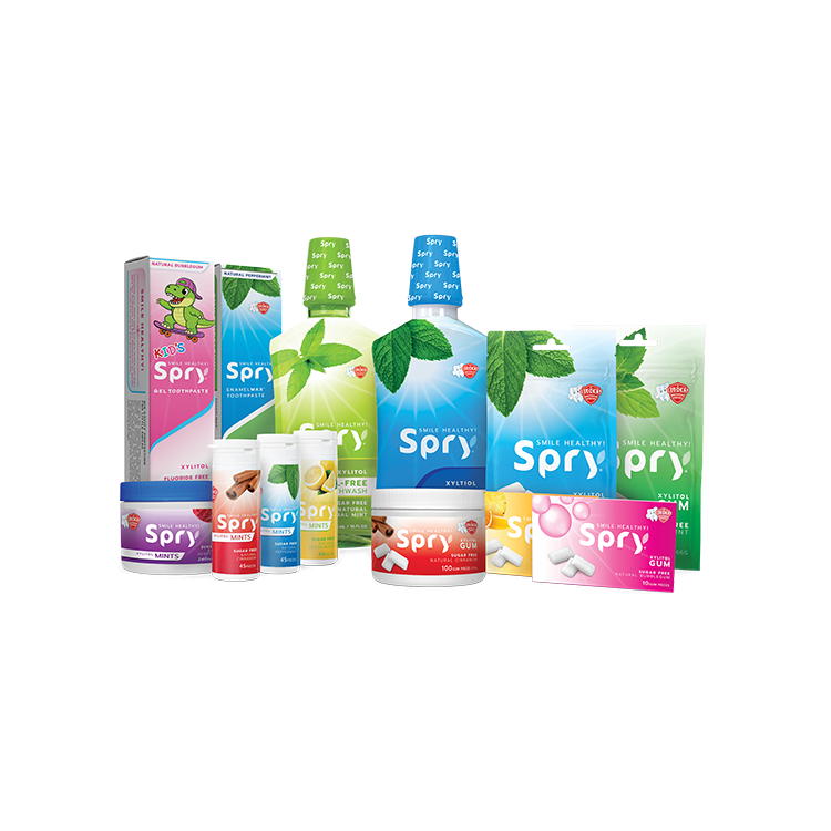 Collection of Spry dental products including mouthwash, gum, and other related items on a white background.