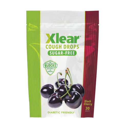 Xclear Cough Drops packaging with black cherry illustration on a white background