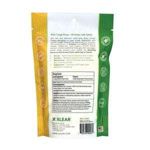 Xlear product packaging with yellow and green sections on a white background